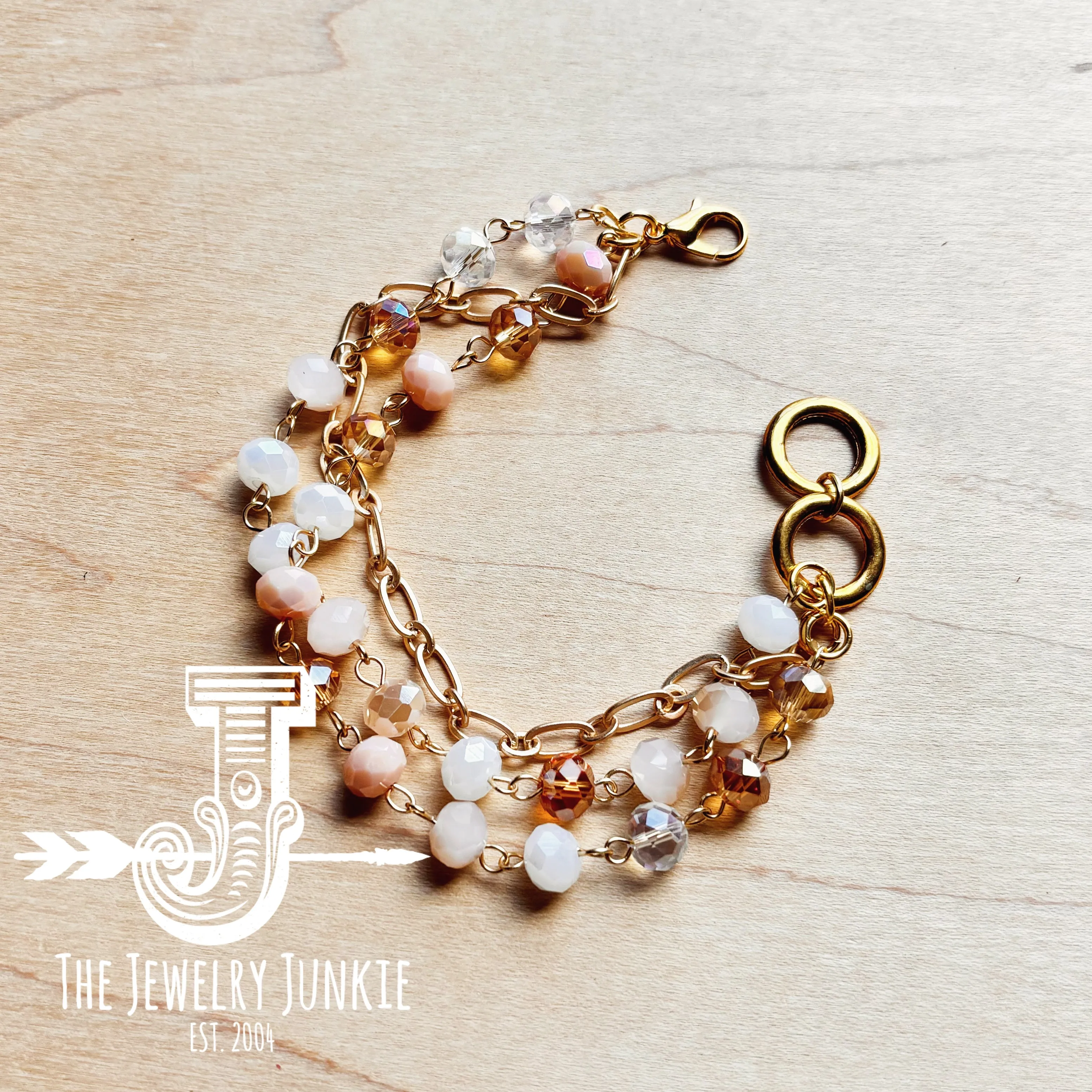 **Champagne Triple Strand Beaded Bracelet